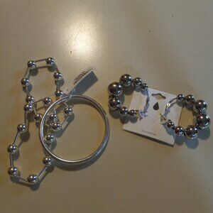 3 silver tone stretch bracelets with beaded coordinating hoop earring
